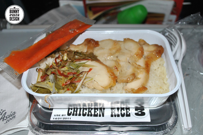 Airplane meal: Chicken rice with chili sauce. Flying into Kuala Lumpur.